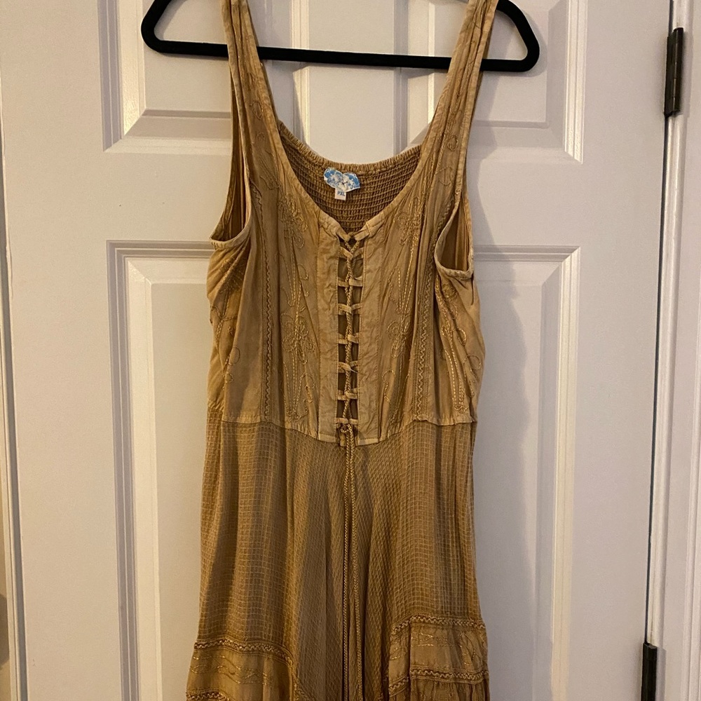 Beautiful dress never used. Purchased at boutique